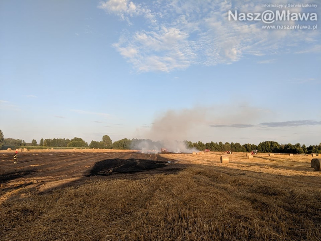 Pożar maszyny - uratowano budynki. Pomogli strażacy i sąsiedzi [ZDJĘCIA I FILM z drona]